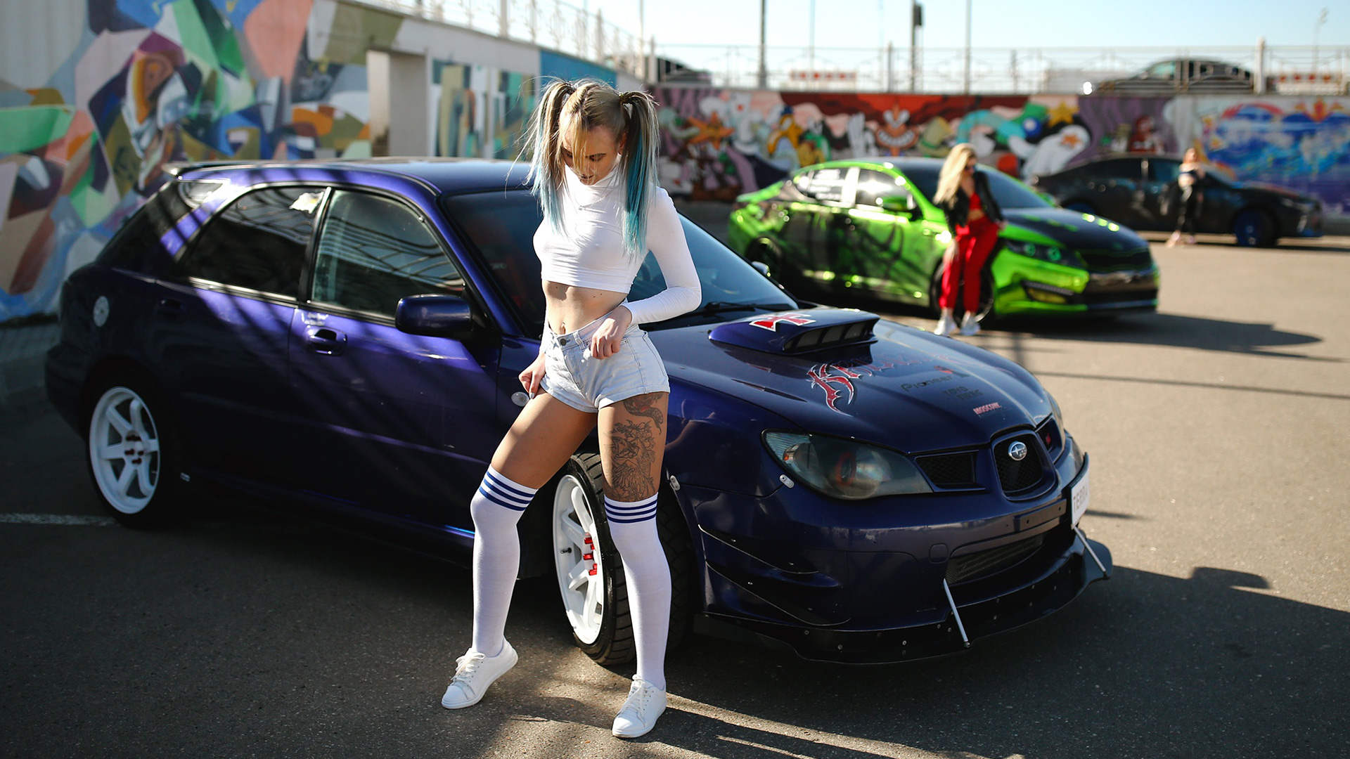 Sport cars and fit girls showcase