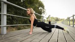 Fit blonde model stretching